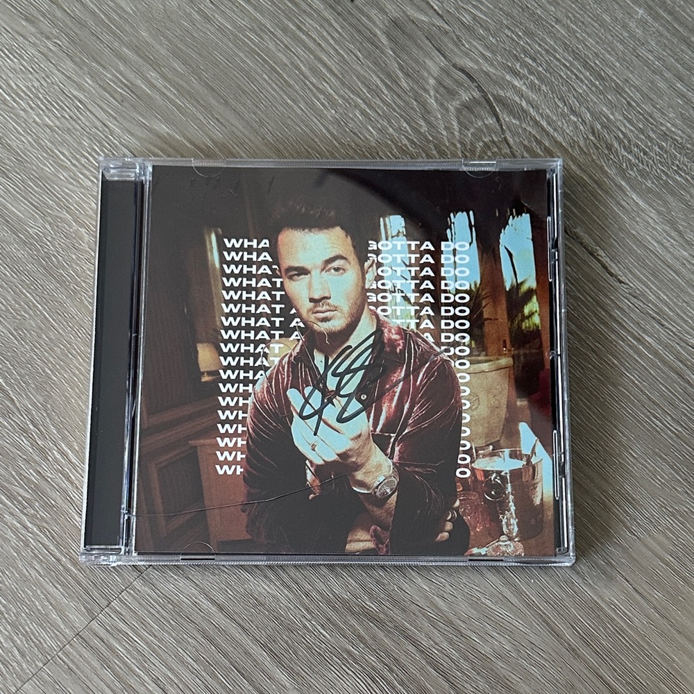 What a Man Gotta Do Signed CD- Kevin Jonas